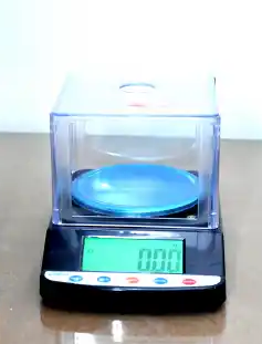 MOISTURE AND GRAMMAGE TESTING MACHINE